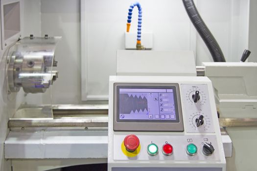 Lathe turning machine and cooling tube and monitor