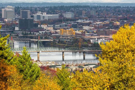 Hawthorne Bridge over Willamette River in downtown Portland Oregon in Fall Season