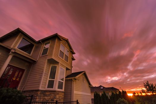 Sunset in North American suburbs neighborhood homes long exposure sky