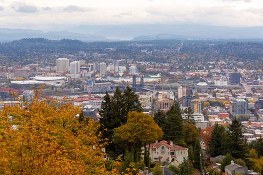 Northwest and Northeast Portland Oregon cityscape and bridges over Willamette River in Fall Season