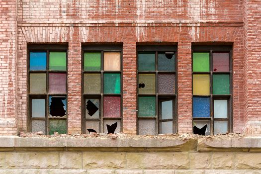 Broken Colorful stained glass windows on old brick building in downtown Portland Oregon being demolished