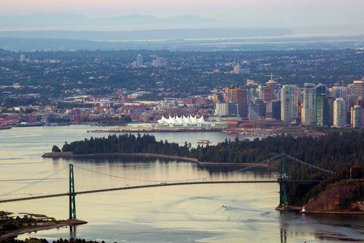 Vancouver British Columbia Canada city skyline by Stanley Park Lions Gate Bridge scenic view