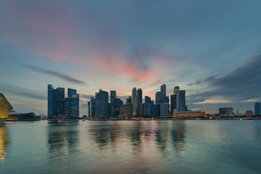 Sunset by Marina Bay Central Business District city skyline in Singapore