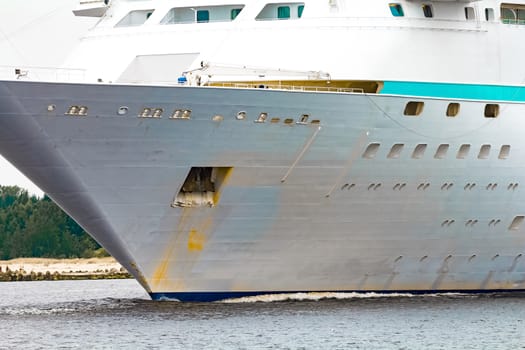 White cruise liner in Riga city. Tour travel and spa services