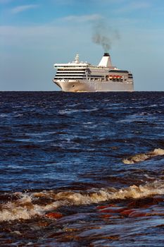 White cruise liner sailing on a clear day