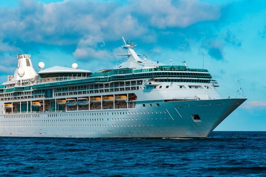 Luxury cruise liner underway. Tour travel and spa services