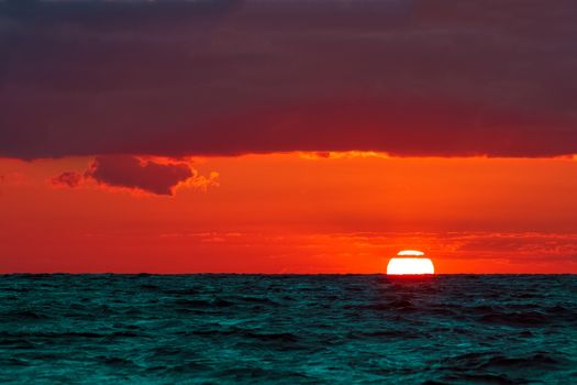 Hot and romantic sunset over the Baltic sea. Calm landscape