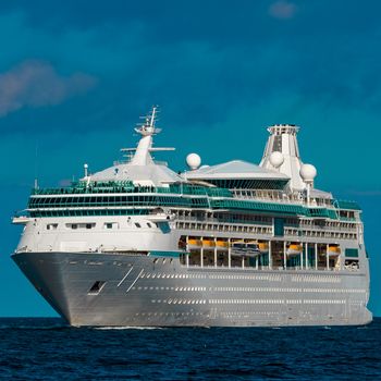 Luxury cruise liner underway. Tour travel and spa services