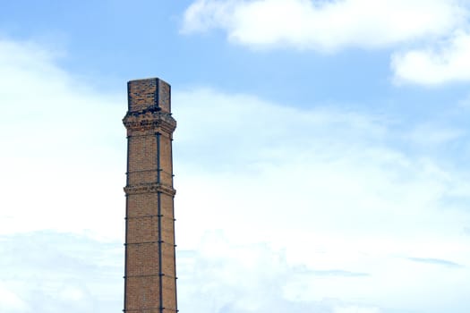 Old smokestack In the blue sky