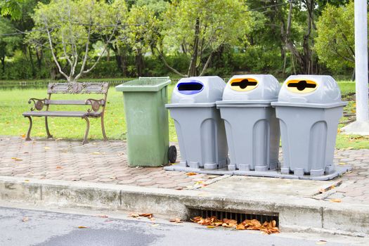 4 bins in the park with steel long chair