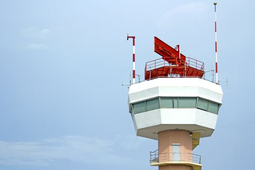 The airport control tower has a red star on top.