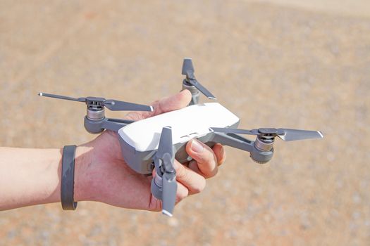 The handle holds the plane up in the sky with Soil background.