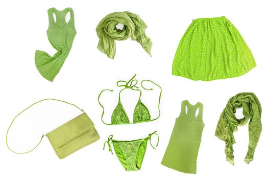 collage of fashionable green summer-spring female clothes and accessories isolated on white background. View from above