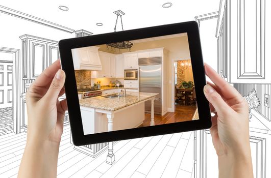 Female Hands Holding Computer Tablet with Kitchen on Screen &amp; Drawing Behind.