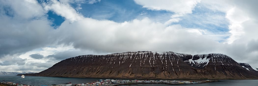 Panoramic view of the mountain and the harbor in Isafjordur, Iceland