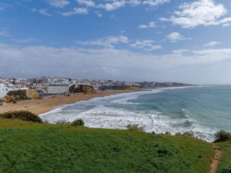 ALBUFEIRA, SOUTHERN ALGARVE/PORTUGAL - MARCH 10 : View of the Beach at Albufeira in Portugal on March 10, 2018. Unidentified people