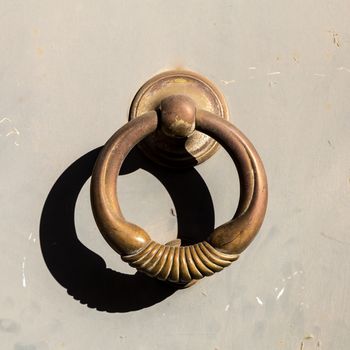 Close up of rustic old door in Florence, Italy.