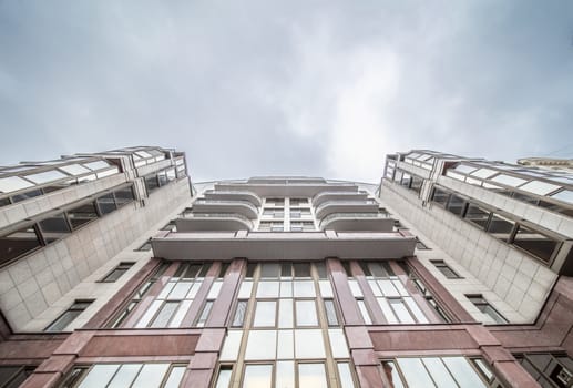 Modern building exterior low angle view with blue sky