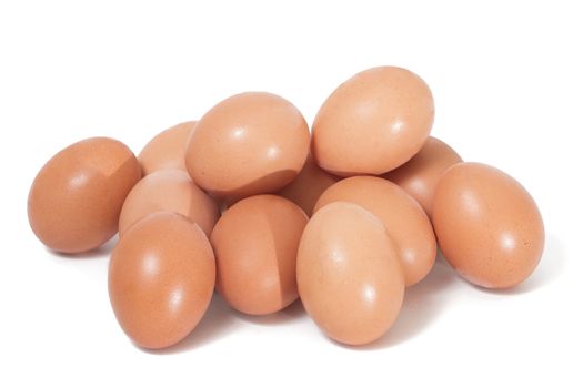 pile of chicken eggs isolated on a white background.