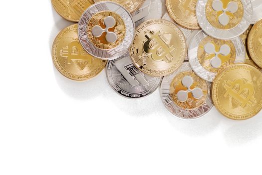 several aligned crypto currency coins on a white background.