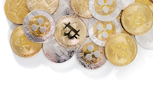 several aligned crypto currency coins on a white background.