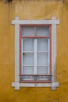 Typical windows of Portuguese architecture in buildings.