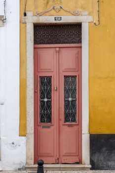 Typical wooden doors of Portuguese architecture in buildings.