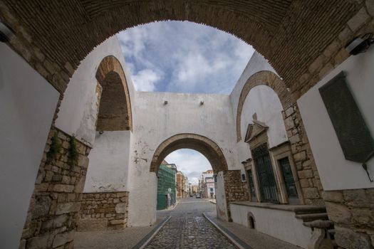 View of the Historical arch in Faro city, Portugal.