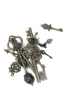 vintage fantasy detailed golden keys isolated on a white background.