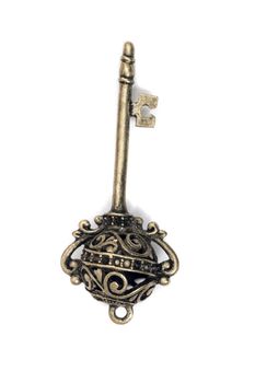 vintage fantasy detailed golden key isolated on a white background.