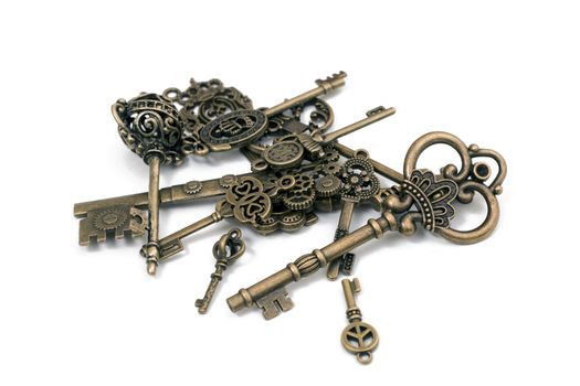 vintage fantasy detailed golden keys isolated on a white background.