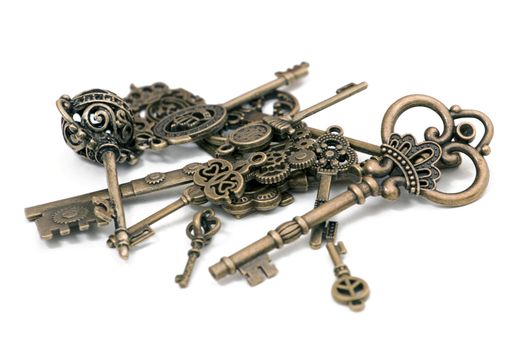 vintage fantasy detailed golden keys isolated on a white background.