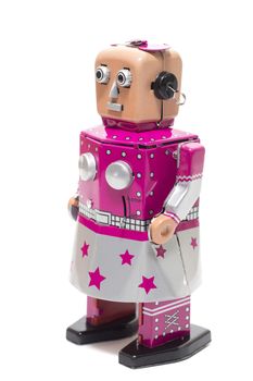 Vintage retro female tin toy robot isolated on a white background.