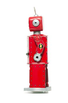 Vintage retro red tin toy robot isolated on a white background.