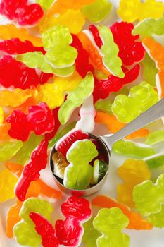 colorful gummy candies in the shape of crocodiles and frogs