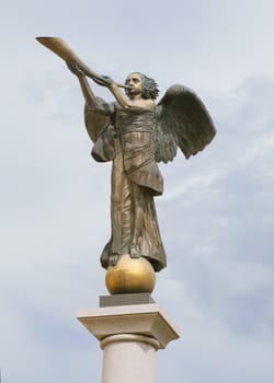 Angel blowing a horn, symbol of Uzupis, art district in Vilnius, Lithuania