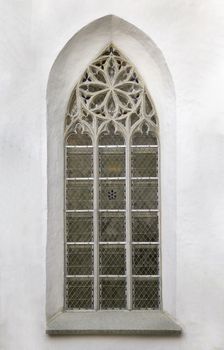 Ornamented window of a cathedral in gothic style