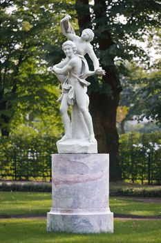 Statue of two playing boys in the Summer Garden, St. Petersburg, Russia