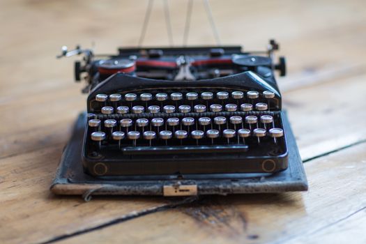 Vintage typewriter hero header on wooden desk