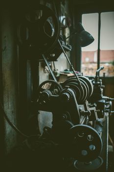 vintage metal turning machine in workshop