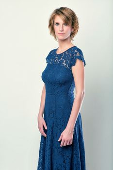 beauty attractive girl in blue lace clothes