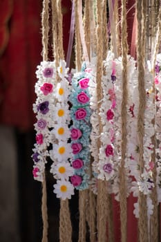 colorful crowns  for sale made of fake flowers