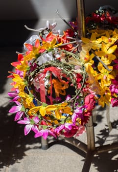 colorful crowns  for sale made of fake flowers