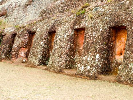 Mysterious niches in the rock, El Fuerte de Samaipata, Bolivia, South America. UNESCO World Heritage Site.