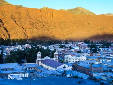 Small town of Tupiza covered by shadow just before dusk. Southern Bolivia, South America.