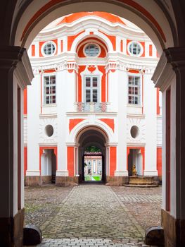 Benedictine Monastery in Broumov. Main courtyard with entrance gate. Czech Republic.