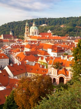 Lesser Town cityscape with St Nicholas Church, Prague, Czech Republic.