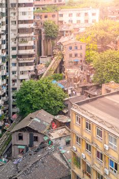 Aerial view of dirty city slum with old unfunctional ground cable car way in Chongqing, China.