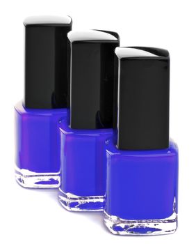 Three Shades of Purple Bright Nail Varnishes isolated on white background