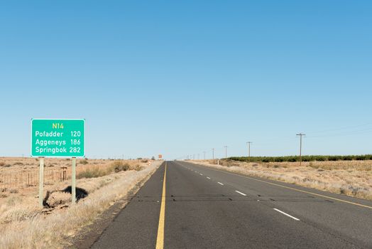 A distance sign on the N14 road between Kakamas and Pofadder in the Northern Cape Province